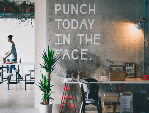 Punch today in the face writing on bare wall Punch today in the face writing on bare wall