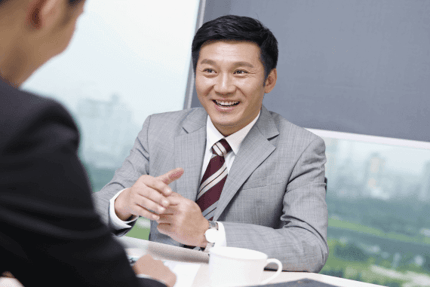 smiling-manager-570x381