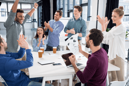team-celebrating-570x381