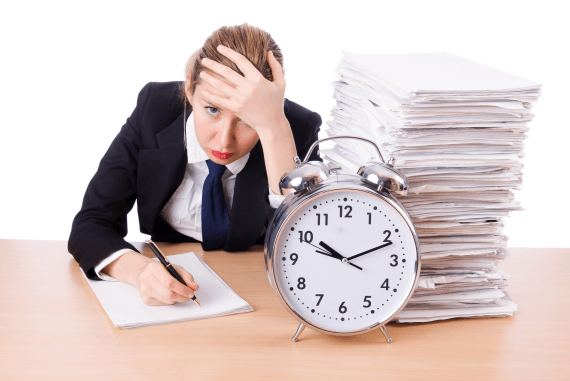 A manager with a clock and not enough time A manager with a clock and not enough time