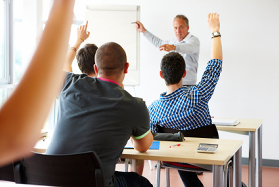 A manager training others within a business A manager training others within a business