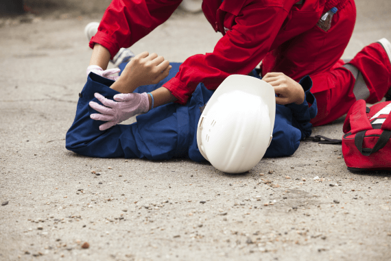 Receiving first aid after an accident at work