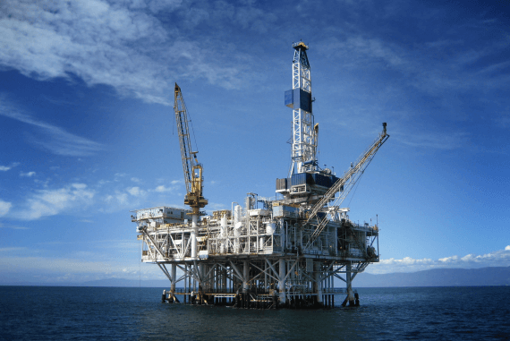 An oil and gas drilling rig in the ocean